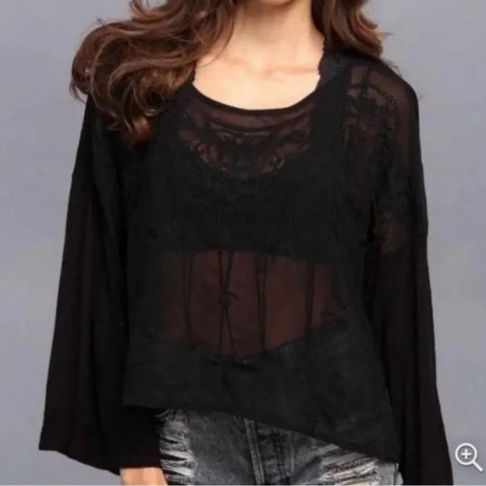 Free People Black Sheer Long Sleeve Boho Oversized Top with Embroidered Detail.